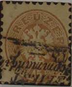 Aquila bicipite in ovale. Francobollo emesso nel 1863.